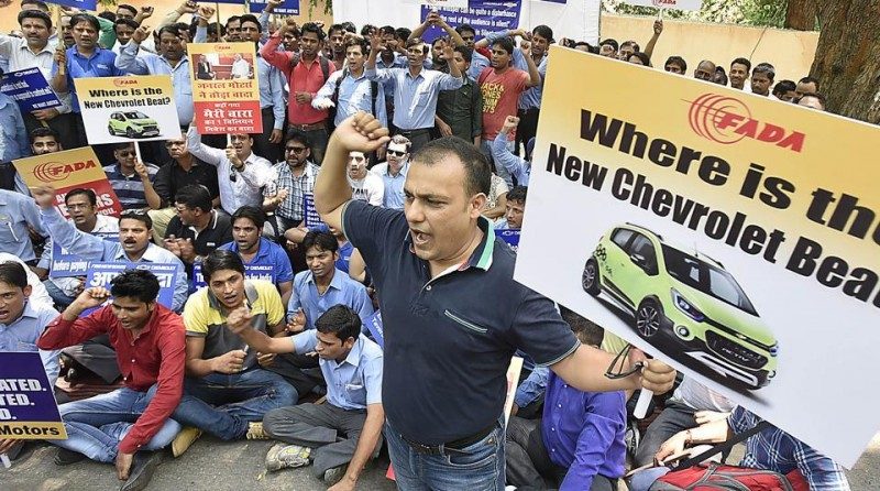 GM in conflict met dealers in India